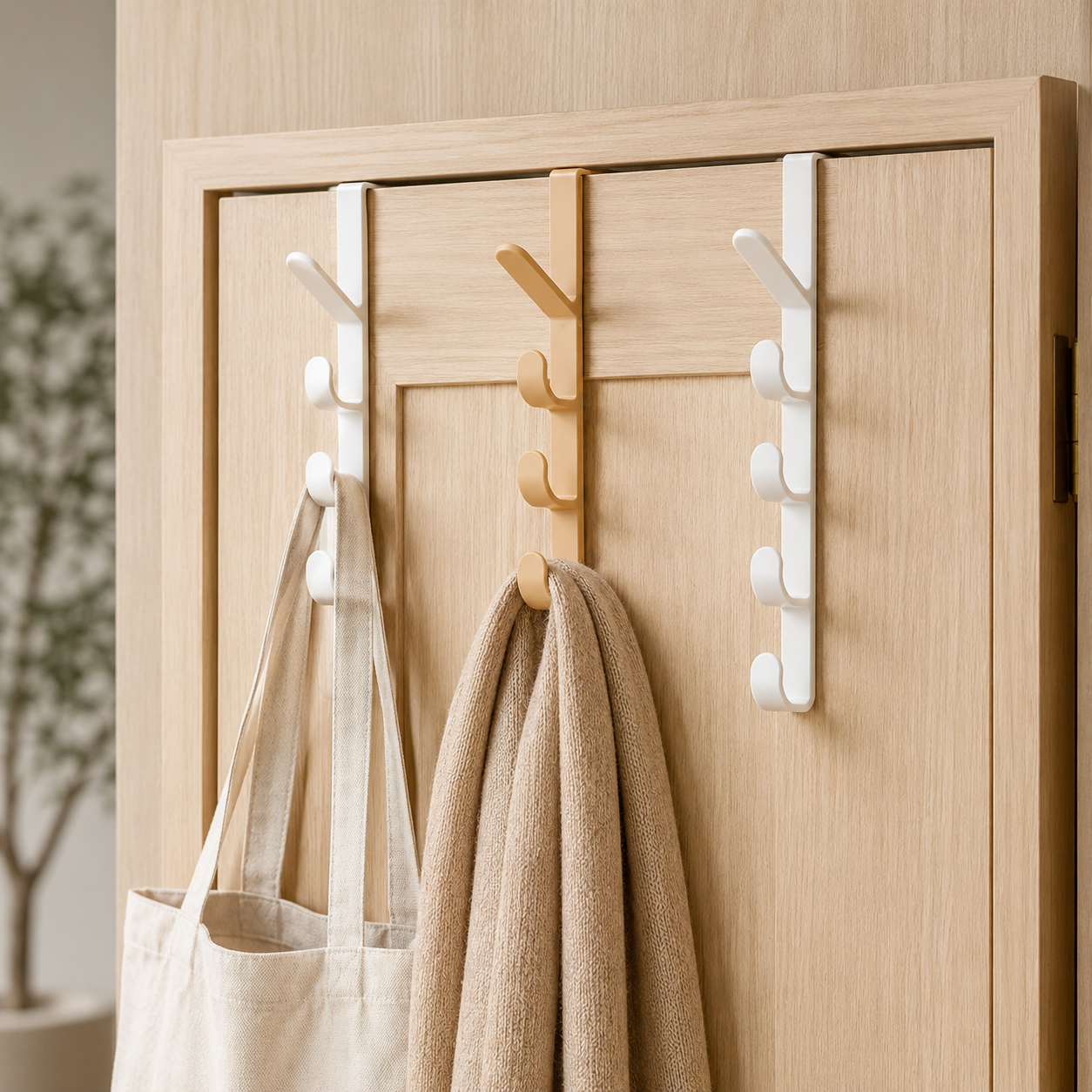 Over-the-door 5 hook organizer rack holding a tote bag and sweater